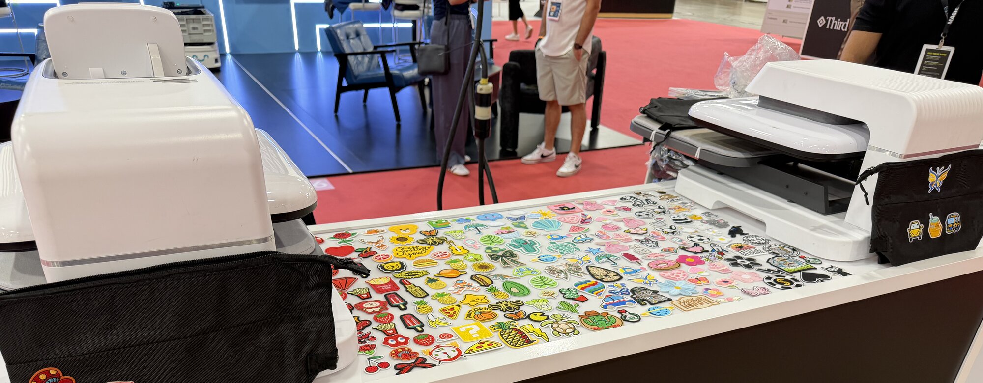 Live Travel Bag Patch Bar at the Las Vegas Convention Center — live printing by Merch Troop