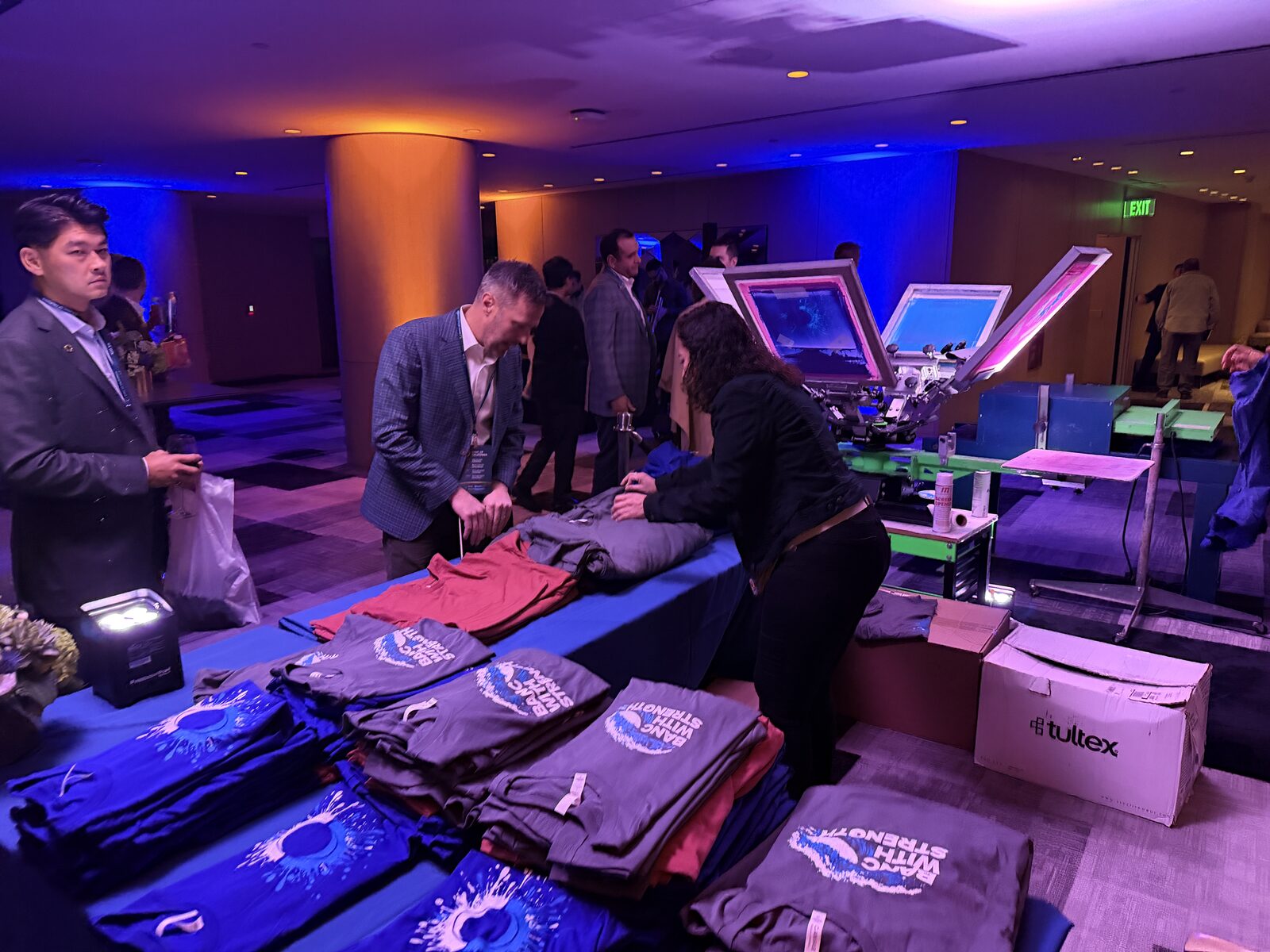 Live screen printing activation for Banc of California at the Fairmont Century Plaza in Century City, with branded tees and on-site press stations